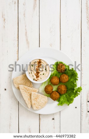 Similar – Foto Bild Falafel und Gemüse auf weißem Holzgrund