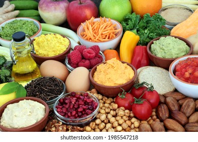Vegetarian food for a healthy high fibre diet high in protein, omega 3, vitamins, minerals, antioxidants, anthocyanins and fibre. Vegetables, fruit, olive oil, legumes, dips, black tea, and dairy.