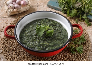 Vegetarian Food With Nettle Herb On Rustic Stone Background