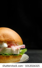 Vegetarian Greek Burger On Black Background