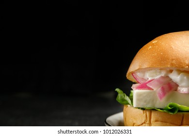 Vegetarian Greek Burger On Black Background