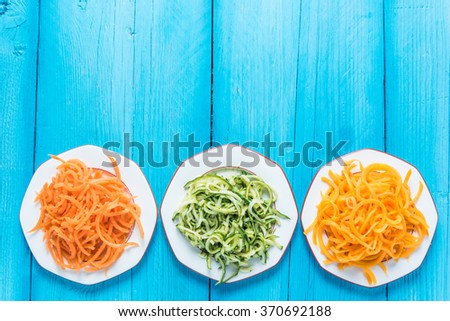 Vegetarian and healthy spaghetti, lay flat on table from above