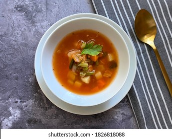 Vegetarian, Healthy Vegetable Minestrone Soup Is Made With Red And Yellow Carrots, Onions, Garlic, Celery, Potatoes, Diced Tomatoes, Tomato Paste, Parsley, Green Peas And Oregano. Copy Space For Text.