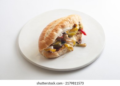 Vegetarian Philly Cheesesteak On A White Plate And White Background