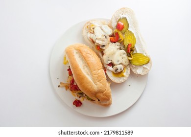 Vegetarian Philly Cheesesteak On A White Plate And White Background