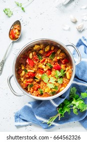 Vegetarian Stew (thick Soup) With Quinoa, Beans And Vegetables. Kitchen Scenery And Cooking - Pot On The Grey Stone Worktop Captured From Above (top View, Flat Lay).