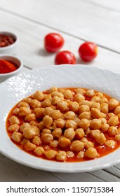 Vegetarian Tasty Spicy Chick Pea Soup On A Wooden Background / Cheakpea Stew/  Turkish Nohut Pilaki