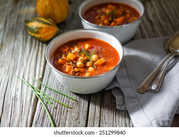 Vegetarian Tasty Spicy Chili Chick Pea Pumpkin Wild Rice Soup Pozole Stew Bowl On A Wooden Background 