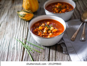 Vegetarian Tasty Spicy Chili Chick Pea Pumpkin Wild Rice Soup Pozole Stew Bowl On A Wooden Background 