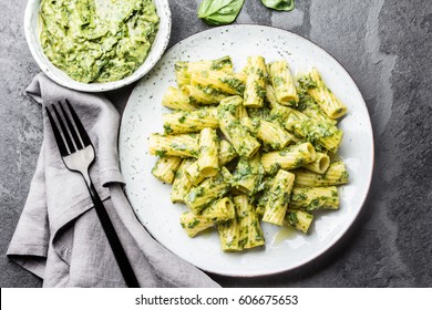 Vegetarian Vegan Green Pasta With Green Avocado Basil Coriander Sauce And Ingredients. Vegetarian Healthy Summer Food. Slate Black Background. Top View. Copy Space