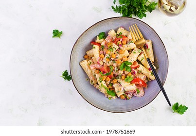 Vegetarian Vegetable Pasta. Pasta Rigatoni With Tomato, Red Onion, Parsley And Fried Chickpeas With Nut Sauce. Vegan Food. Top View, Overhead