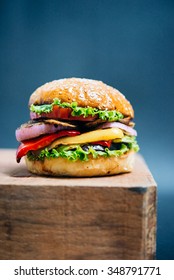 Vegetarian Or Veggie Burger On Wooden Board