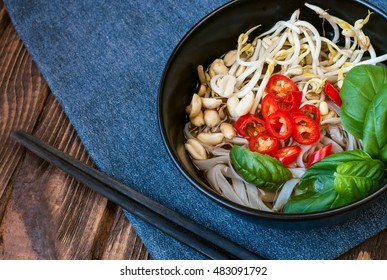 Vegetarian Vietnamese Style Soup Pho With Chopsticks. Traditional Asian Cuisine.