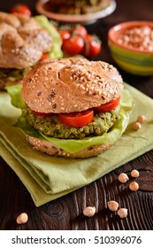 Vegetarian Whole Wheat Burger With Chickpeas - Spinach Fritter, Lettuce And Tomato Garnish