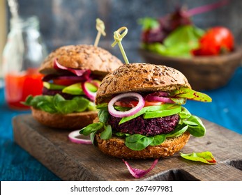 Veggie beet and quinoa burger with avocado