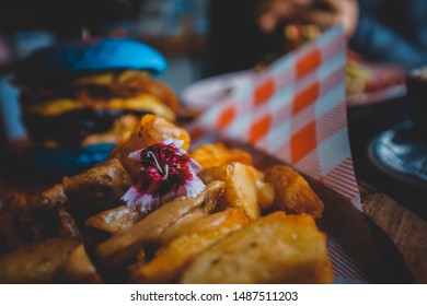 
Veggie Burger  With Chips On The Wooden Dish