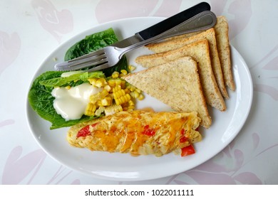 Veggie Omelette, Healthy Breakfast With Salad And Bread. 