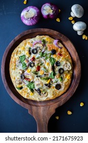 Veggie Thin Crust Pizza With Mushrooms Peppers Olives And Spinach