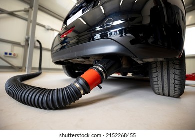 Vehicle emissions testing involves putting an automobile through a series of stringent assessments to discover its fuel efficiency and the amount of greenhouse gases it produces. - Shutterstock ID 2152268455