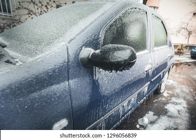 Vehicle in ice. Natural Icy rain. Heavy freezing rain cover on car. Winter Crushed ice. Hoarfrost. Crust of ice after Icy rain. Icy Accumulation. frozen droplets of ice coated car - Powered by Shutterstock