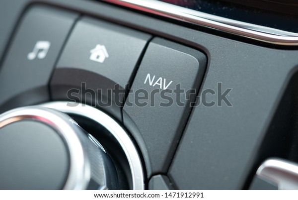 Vehicle interior of a modern car with media and\
navigation control\
buttons