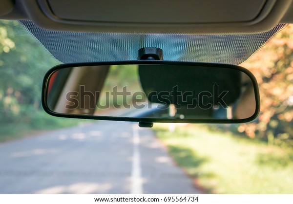 Vehicle interior with rear view mirror and\
windshield - car salon\
concept