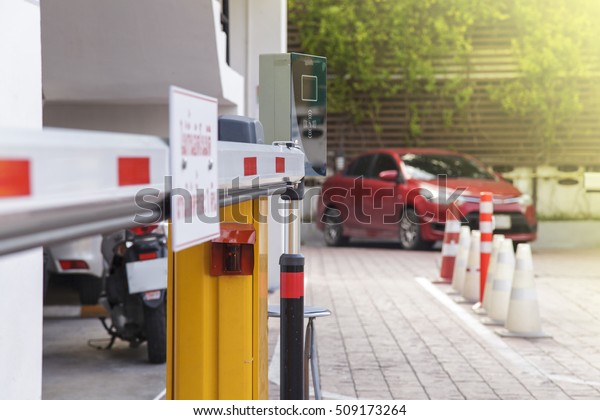 Vehicle security\
barrier gate on the car\
parking