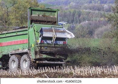 Vehicle Spread Manure On A Field