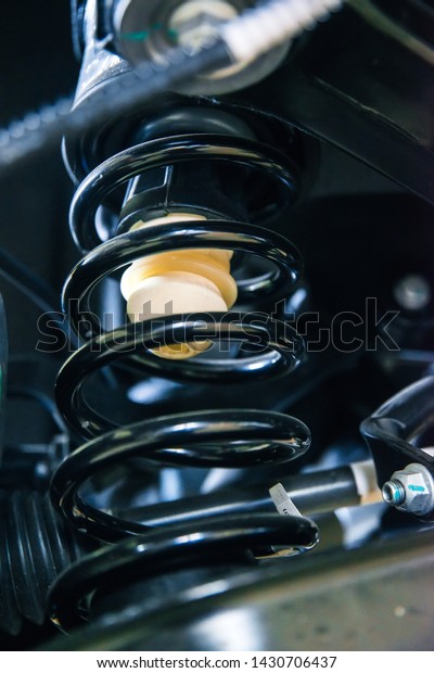 vehicle suspension spring and bump with a shallow\
depth of field