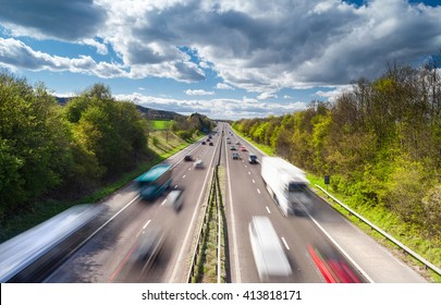Vehicles in Motion on Busy Rural Motorway - Shutterstock ID 413818171