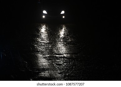 Vehicles Running In The Rainy Wet Street At Night Isolated Cars Headlamp Unique Photograph
