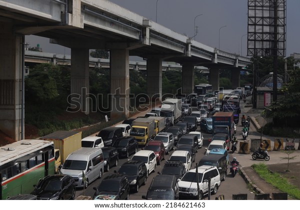 Vehicles are stuck in traffic jams in Bekasi, West\
Java on May 7, 2022.