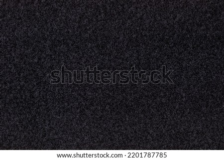Velcro texture. Black fabric background. Place for attaching patches