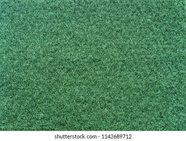 Velcro texture. Green fabric background. Extreme close-up.