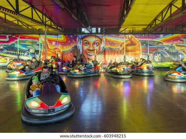 VELENCE,HUNGARY,FEBRUARY 25, 2017 : Winter\
farewell party on Gate of Lake, Velence city.Participants of the\
carnival enjoy the dodgem\
track.