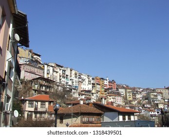 Veliko Tarnovo, Bulgaria - February 2018: Panoramic View Of Historical Part Of City Towering Up The Hill In The Valley Of Yantra River