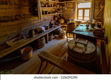 VELIKY NOVGOROD, RUSSIA - May 20, 2018: Peasant Kitchen Utensils In The Interior Of Old Traditional Rural Wooden House In The Museum Of Wooden Architecture Vitoslavlitsy.