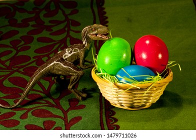 Velociraptor Near Colourful Easter Eggs On Table