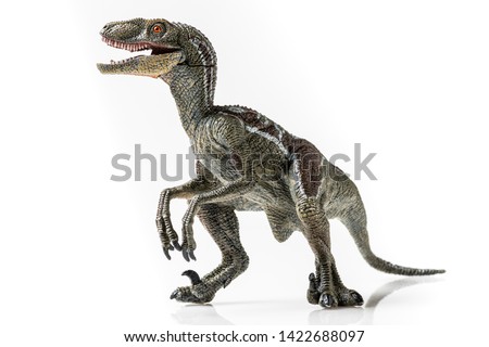 Velociraptor, plastic figurine on white background ストックフォト © 