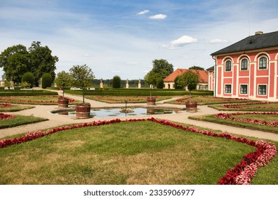 Veltrusy Chateau park in summer under blue sky with white clouds. Czech Republic.