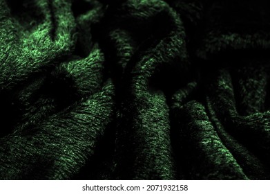 Velvet. Plush. Deep euirid green. fabric with an even pile, longer and less dense than velvet. Expensive or spectacularly luxurious. luxuriously furnished, rich, dear - Shutterstock ID 2071932158