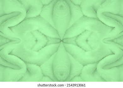 Velvet. Plush. Pale Green. (from the French peluche) - textiles with a short pile or nap, the same as fustian or velvet. Green animal fur texture background, plush furry fur close-up texture.