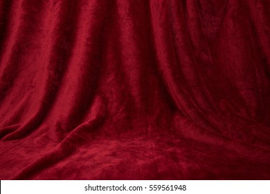 Velvet red draped curtain cloth full frame - Shutterstock ID 559561948