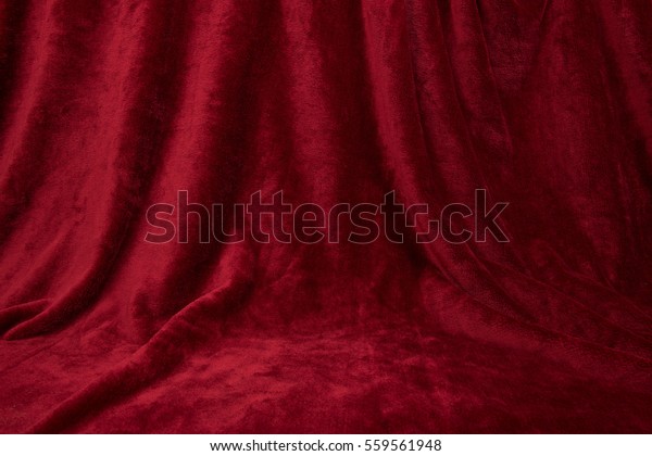 Velvet red draped\
curtain cloth full frame