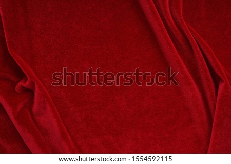 velvet texture red color background, expensive luxury fabric,  wallpaper. Christmas backdrop. copy space