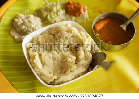 Ven Pongal Khara Pongal with Sambar coconut chutney. Indian breakfast food. Tamil Nadu festival Pongal Sankranti. Diwali spicy pongal made using rice lentil semolina rava South India Sri Lanka
