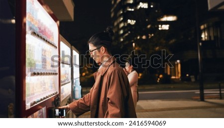 Vending machine, man and phone payment at night, automatic digital purchase or choice in city outdoor. Smartphone, shopping dispenser and Japanese business person on mobile technology in urban Tokyo