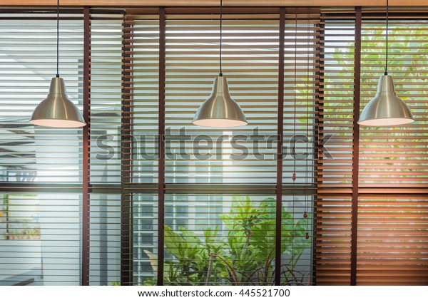 Venetian blind window mask, room interior\
with ceiling lamp beam, blinds window decoration concept for banner\
or background.