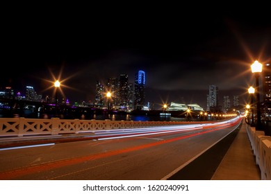 Venetian Causeway At Night With Skyline