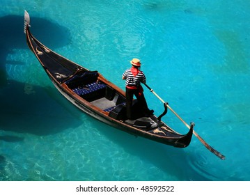 Venetian Gondola On Blue Water